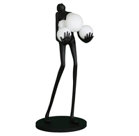 Lampa podłogowa WOMAN – designerska,czarna figura kobiety z białymi kloszami, 180 cm