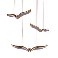 GUFO 3 – LED złoty ptak w różowym złocie, 36 cm