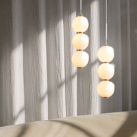 Nowoczesna lampa wisząca PERLA LED - białe kule 12 cm
