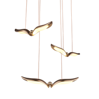 GUFO 3 – LED złoty ptak w różowym złocie, 36 cm