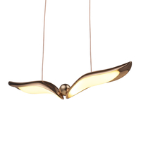 GUFO 1 – LED złoty ptak w różowym złocie, 36 cm